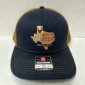 Brett's Biltong Dallas navy and tan trucker cap with leather patch