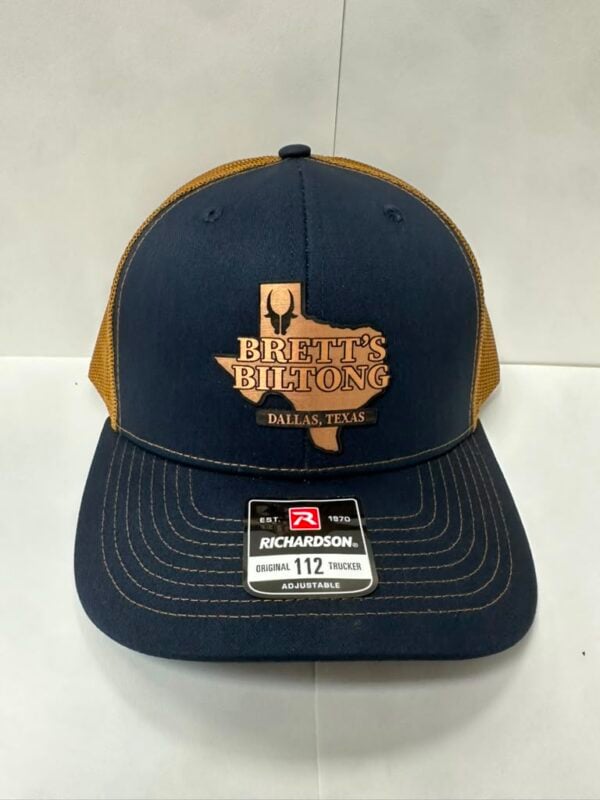 Brett's Biltong Dallas navy and tan trucker cap with leather patch